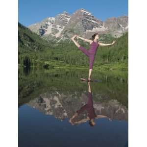  Young Woman Practicing Yoga in a Scenic Mountain Lake 