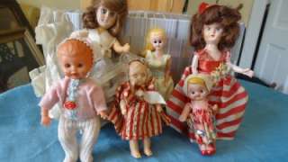   Plastic Little Dolls Weird Faces Strange Eyes Altered Art find?  