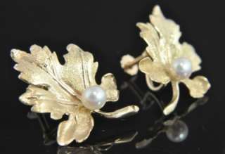   vintage estate maple leaf earrings crafted from solid 14k yellow gold