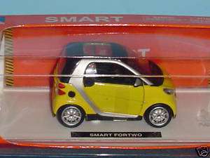 2008 SMART CAR TWO PASSENGER 124 YELLOW by NEW RAY  