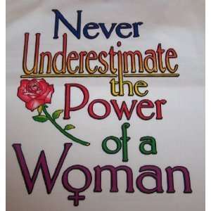 TEE SHIRT~NEVER UNDERESTIMATE THE POWER OF A WOMAN~SIZE MEDIUM