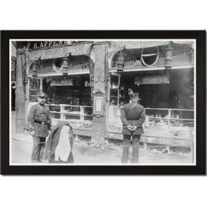   Parisian Police Look at German Shops Ransacked by Mob