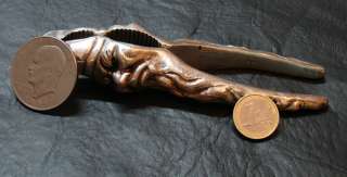   solid bronze silverplated two faces barbed old man nut cracker