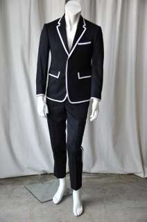 Striking and polished, this Thom Browne suit has an ultra appealing 