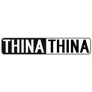   NEGATIVE THINA  STREET SIGN