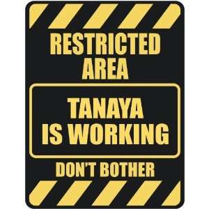   RESTRICTED AREA TANAYA IS WORKING  PARKING SIGN