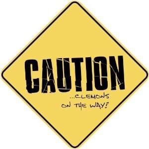   CAUTION  CLEMONS ON THE WAY  CROSSING SIGN