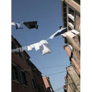  Laundry Hanging from Clotheslines Between Apartment 