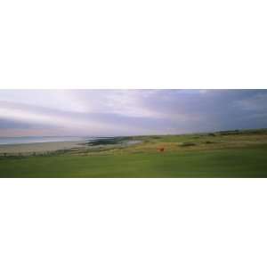 com Golf Flag on a Golf Course, Royal Porthcawl Golf Club, Porthcawl 