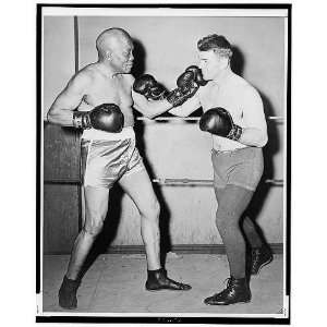  Jack Johnson in the boxing ring with Steve Dudos,1945 