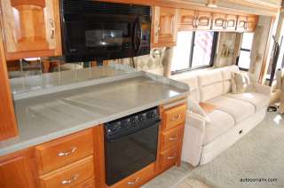 SOLID SURFACE COUNTER TOPS IN KITCHEN W/ CONVECTION MICROWAVE AND 3 