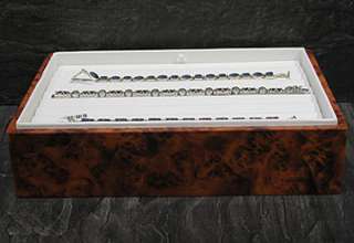   item f63 31 amber burl white leather bracelet tray we are proud