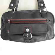 Soft, supple black leather with sporty red trim Outside side pouch 