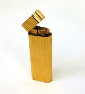   cartier gold plated cigarette lighter the piece is well crafted