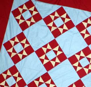 Traditional Amish Dreams, Ohio Star Quilt, lighter blue background 