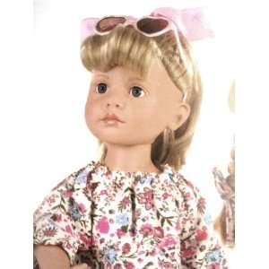  Gotz doll vinyl doll with sunglasses and pink stripey bow 