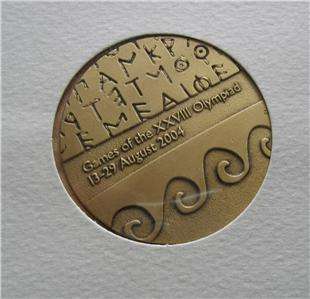 Double Official Olympic Participation Medal Athens 2004 in folder 