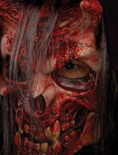 This is one bloody devil Latex, skeletal, bloody half mask with hood 