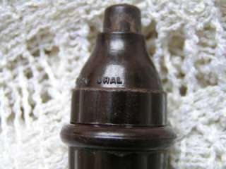 am very pleased to offer an antique push button for lamp, made in 