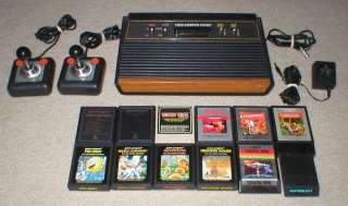 Atari 2600 System W/ 12 Games Donkey Kong, Pac Man Adventure, Cosmic 