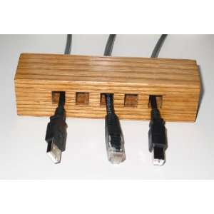Oak Desktop Cable Organizer, in golden oak finish, to keep your cables 
