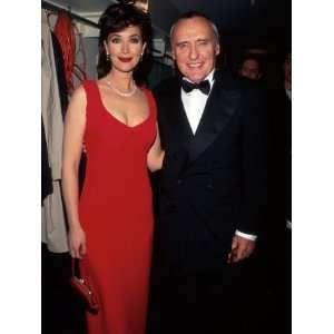  Actors Janine Turner, Wearing Red Gown, and Dennis Hopper 