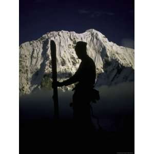  Skiers Silhouette, Tibet Premium Poster Print by Michael Brown 