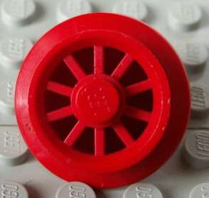 x556 red wheel with spoked center and beveled hub